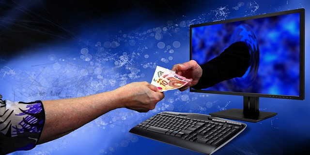 Arm of hacker extended out of a computer screen taking bills from unsuspecting user with royal blue background