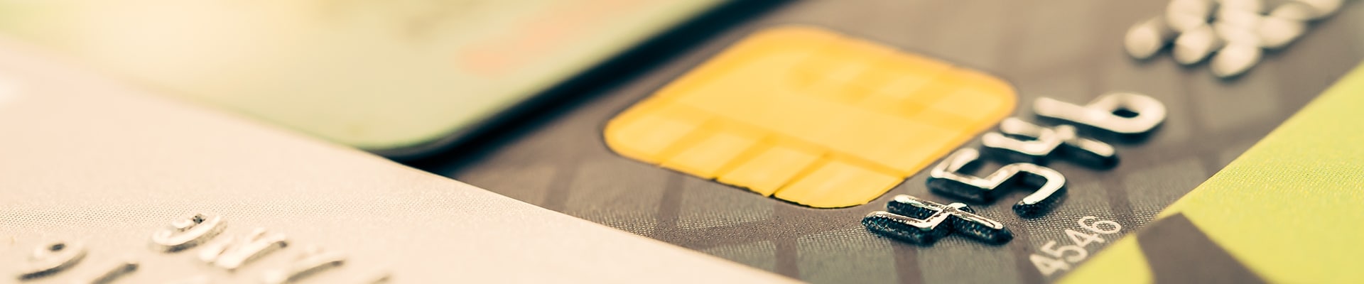 Closeup of a yellow credit card.