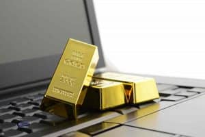 Gold bullion on laptop